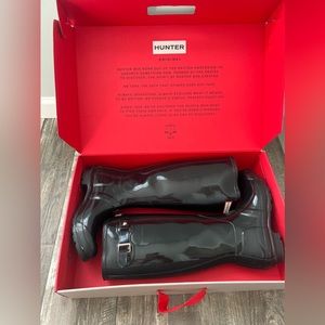 Women’s black glossy tall hunter boots
